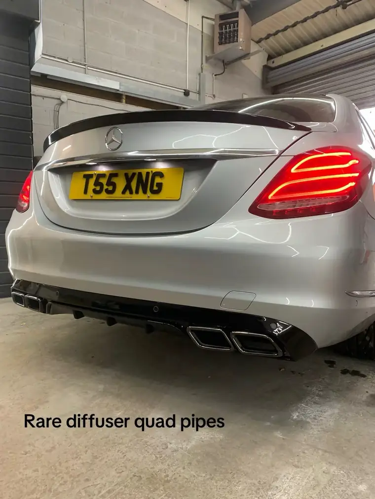 The same Mercedes with a boot spoiler and quad-pipe rear diffuser